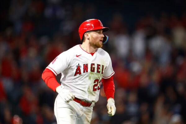 Brandon Drury (23) of the Los Angeles Angels hits a rbi triple against the Houston Astros in the eighth inning at Angel Stadium of Anaheim in Anaheim, Calif., on May 8, 2023. (Ronald Martinez/Getty Images)