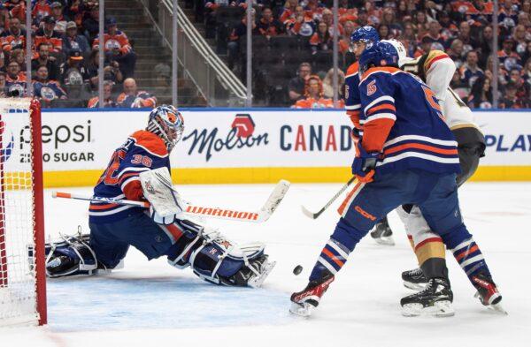 Edmonton Oilers goalie Jack Campbell (36) makes a save against the Vegas Golden Knights during third-period NHL hockey Stanley Cup second-round playoff game action in Edmonton, Alberta, Canada, on May 8, 2023. (Jason Franson/The Canadian Press via AP)