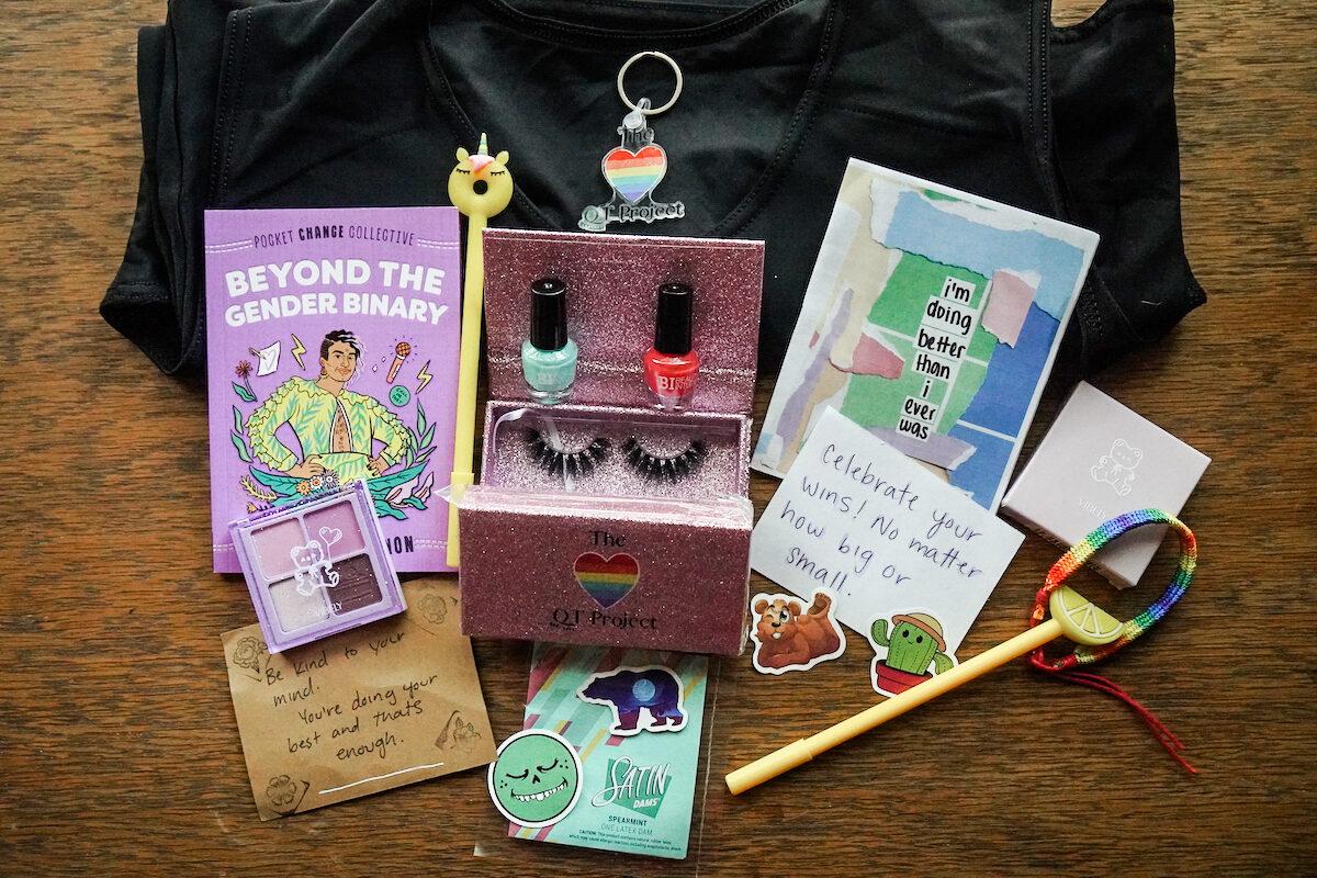 Items from two "Build-a-Queer" kits shipped in April 2023 from the Queer Trans Project. (The Epoch Times)