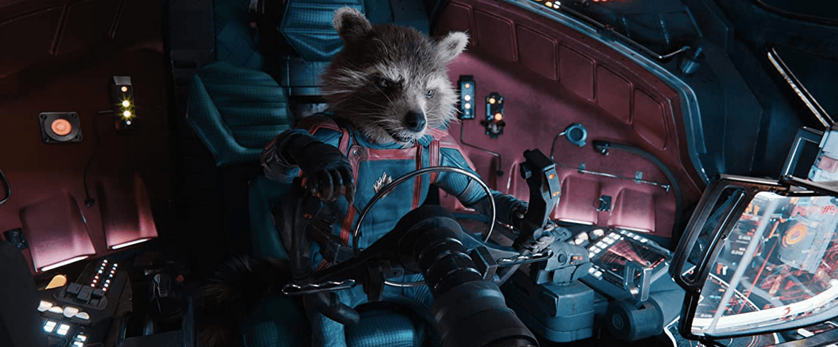 Rocket Racoon (voiced by Bradley Cooper) pilots a spaceship, in "Guardians of the Galaxy Vol. 3." (Marvel Studios)