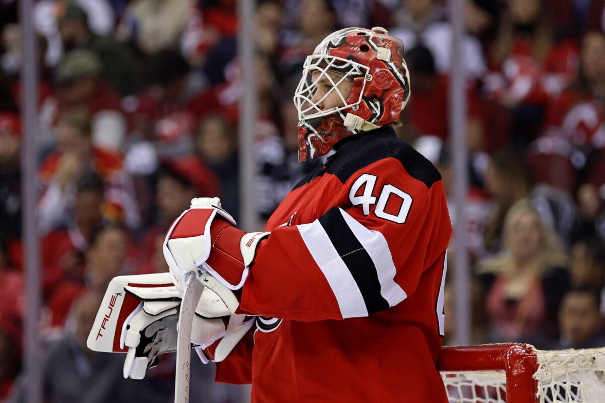 New Jersey Devils goaltender Akira Schmid reacts after giving up a goal to Carolina Hurricanes left wing Jordan Martinook (not shown) during the second period of Game 4 of an NHL hockey Stanley Cup second-round playoff series in Newark, N.J., on May 9, 2023. (Adam Hunger/AP Photo)