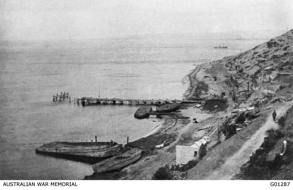 A view of Watson's Pier at ANZAC Cove shortly before the final evacuation. ANZAC Beach was utterly deserted but fortunately, Turkish airmen flew too high to notice this. (AAP Image/ Australian War Memorial)