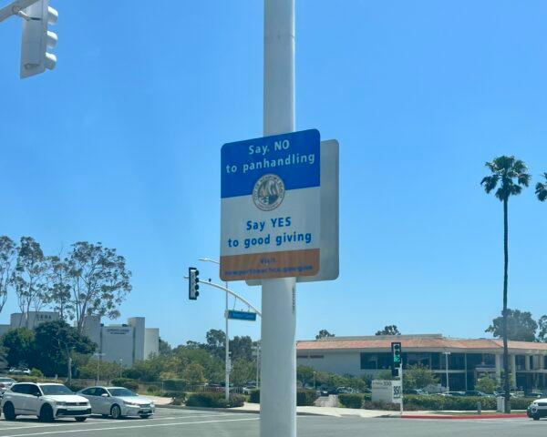 A sign posted in Newport Beach, Calif., that read “Say NO to panhandling. Say YES to good giving,” is seen on May 10, 2023. (Courtesy of Robyn Grant)