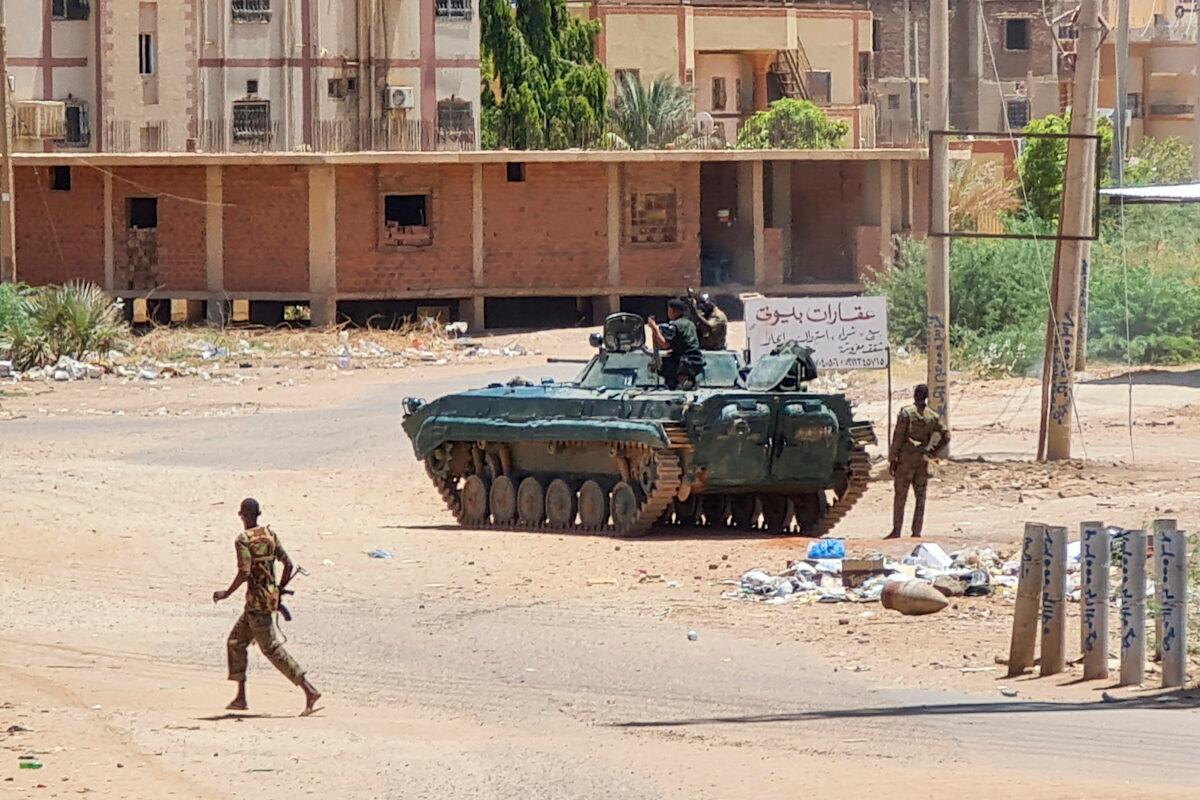 Sudanese army soldiers near armored vehicles amid ongoing fighting against the paramilitary Rapid Support Forces in southern Khartoum, on May 6, 2023. (AFP via Getty Images)