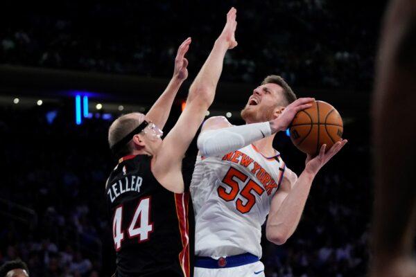 Miami Heat's Cody Zeller (44) defends against New York Knicks' Isaiah Hartenstein (55) during the second half of Game 5 of an NBA basketball Eastern Conference playoffs semifinal, in New York on May 10, 2023. (Frank Franklin II/AP Photo)