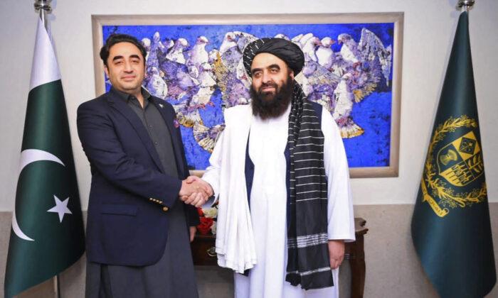 Pakistan's Foreign Minister Bilawal Bhutto Zardari (L) shakes hands with Afghanistan's Foreign Minister Amir Khan Muttaqi during a meeting in Islamabad on May 7, 2023. (Pakistan's Ministry of Foreign Affairs/AFP/Getty Images)