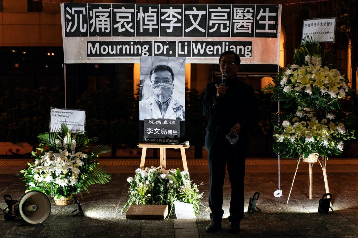 People attend a vigil to mourn for doctor Li Wenliang in Hong Kong on Feb. 7, 2020. (Anthony Kwan/Getty Images)