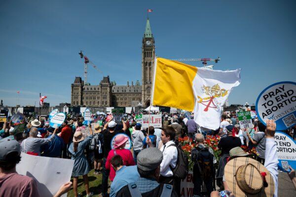 Demonstrators take part in the March for Life event on Parliament Hill in Ottawa on May 11, 2023. (The Canadian Press/Spencer Colby)