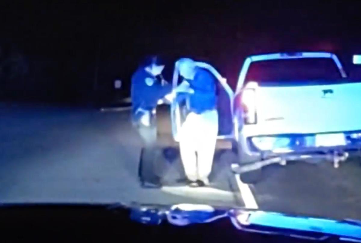 Dashcam footage shows Officer Woodmansee of the Pickens Police Department interacting with the driver of a white pickup truck during a routine traffic stop that turned out to be anything but. (Courtesy of Pickens Police Department)