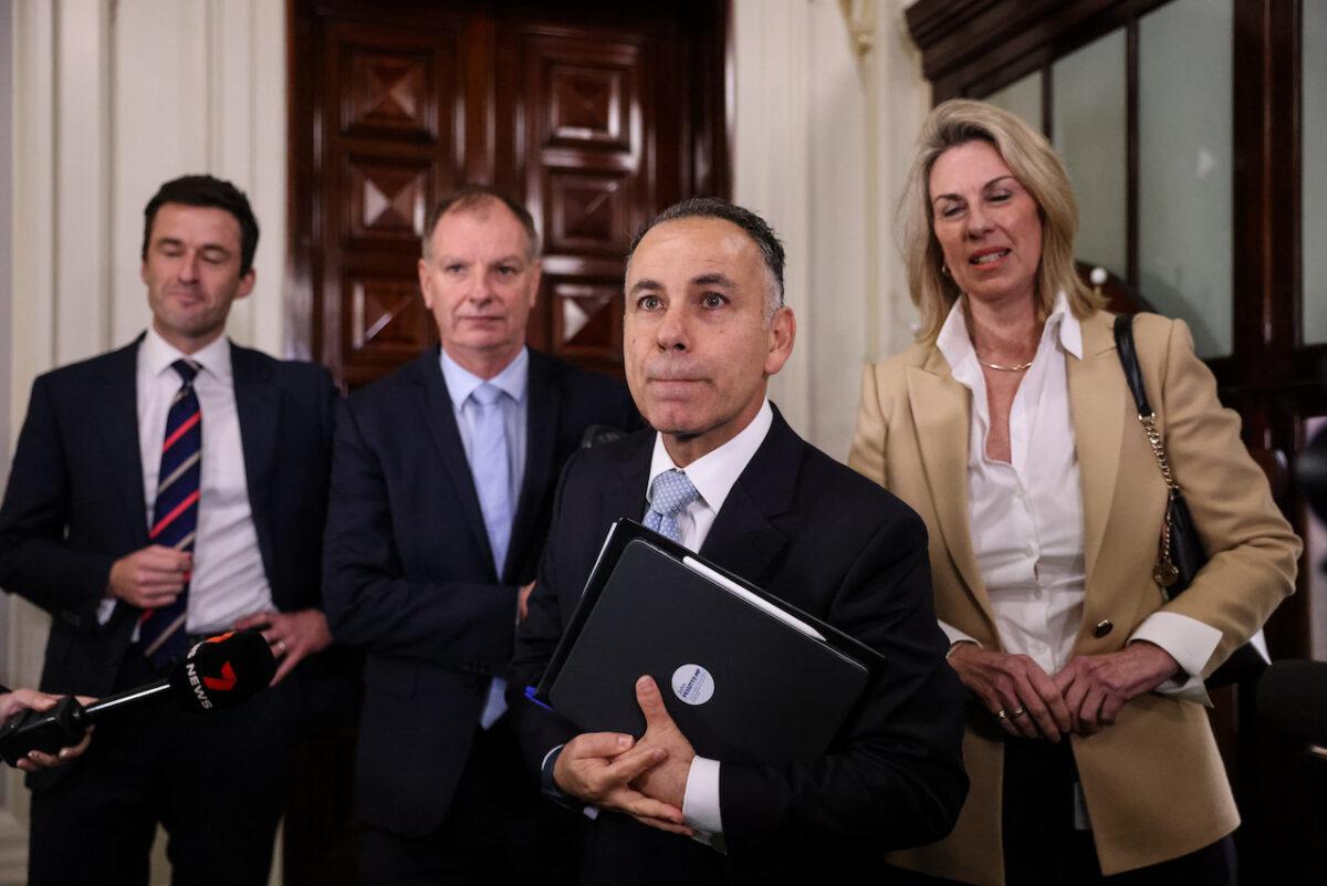 Victorian Opposition Leader John Pesutto (2nd R) leaves his party room at the Parliament of Victoria in Melbourne, Australia, on May 12, 2023. (AAP Image/Diego Fedele)
