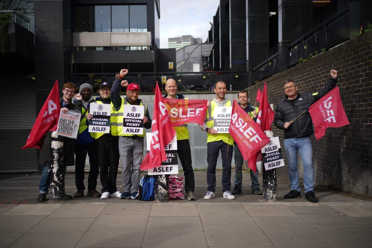 Members of the train drivers' union Aslef on the picket line at Euston station, London, on May 12, 2023. (Yui Mok/PA Media)