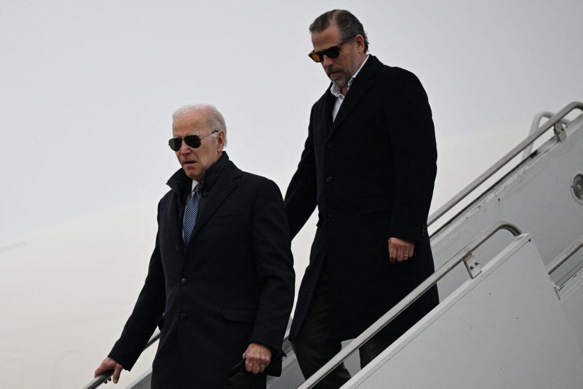 Joe Biden, with son Hunter Biden, arrives at Hancock Field Air National Guard Base in Syracuse, New York, on Feb. 4, 2023. (Andrew Caballero-Reynolds/AFP via Getty Images)