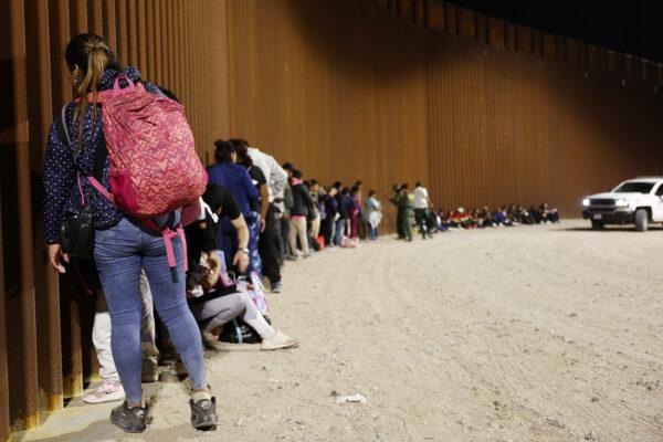 U.S. agents process illegal immigrants who crossed into Arizona from Mexico on May 11, 2023. (Mario Tama/Getty Images)