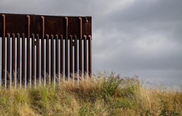 A section of the U.S. border wall sits open in San Diego on May 11, 2023. (John Fredricks/The Epoch Times)