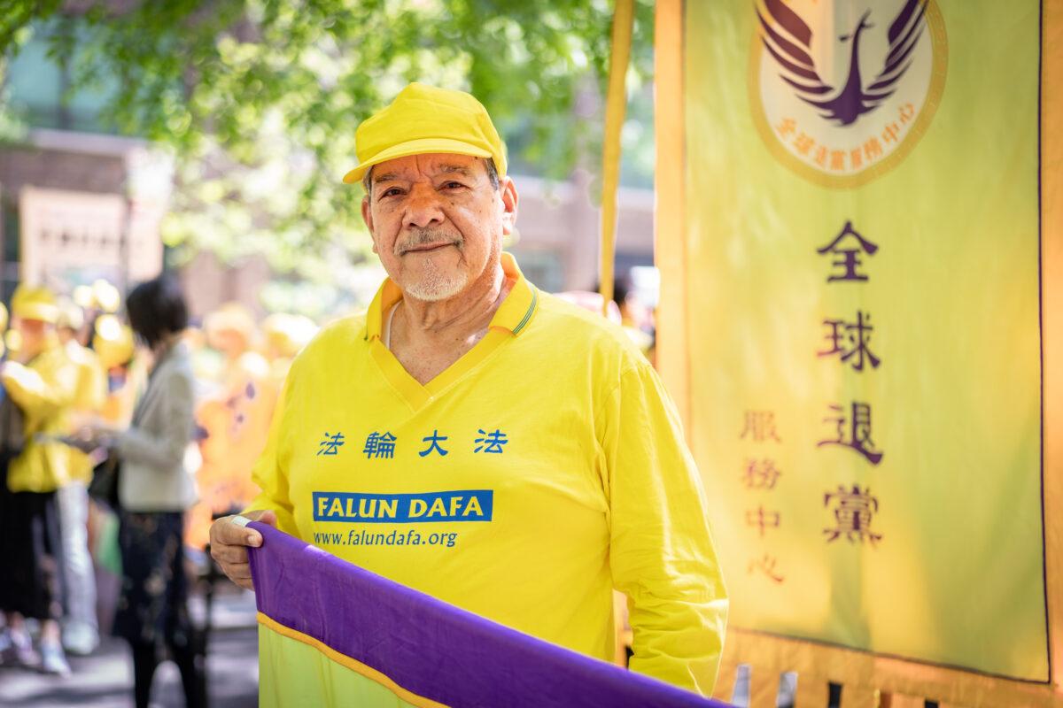 Falun Gong practitioner Eliseo Dardon at the World Falun Dafa Day parade in New York on May 12, 2023. (Samira Bouaou/The Epoch Times)