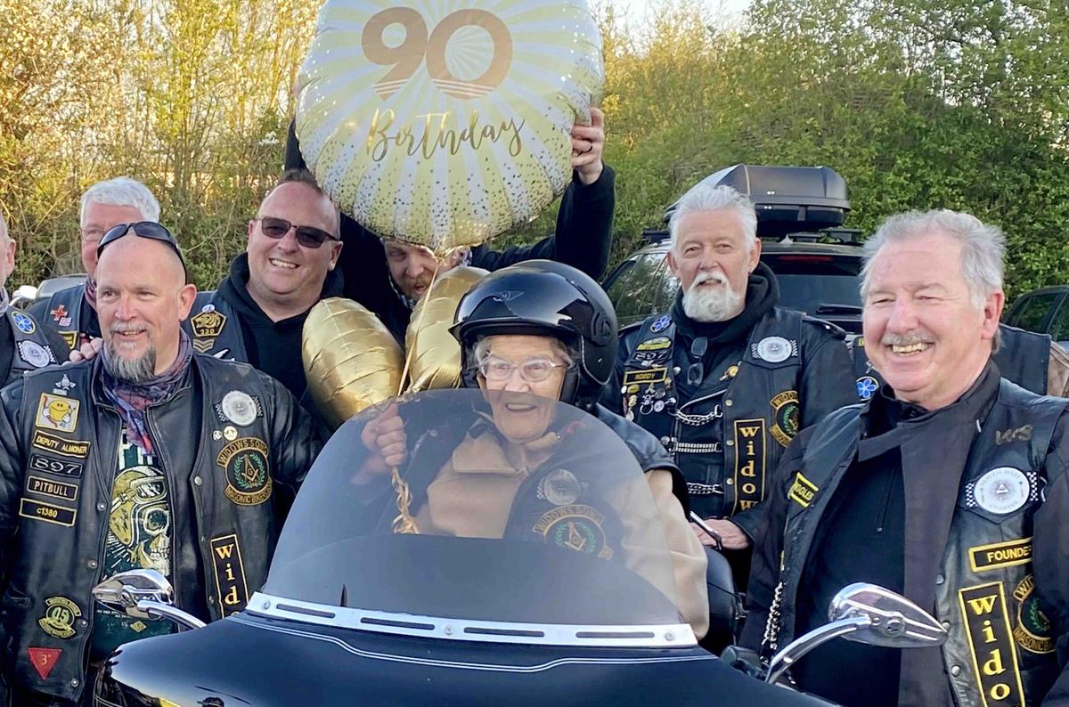 Barbara Morris celebrates her 90 birthday with the Widows Sons motorcycle gang. (SWNS)