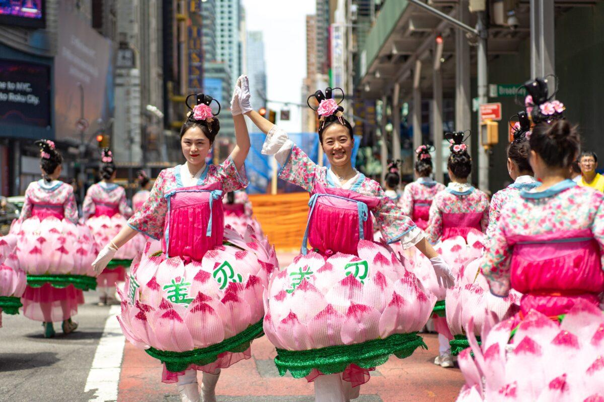 Falun Gong practitioners march in Manhattan to celebrate World Falun Dafa Day on May 12, 2023. (Samira Bouaou/The Epoch Times)