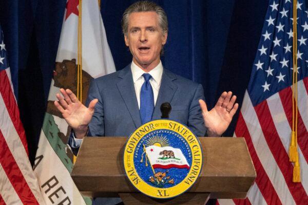 California Gov. Gavin Newsom announces the May budget revision in Sacramento on May 12, 2023. Newsom said the state's budget deficit has grown to nearly $32 billion, about $10 billion more than predicted in January when the governor offered his first budget proposal. (Hector Amezcua/The Sacramento Bee via AP)