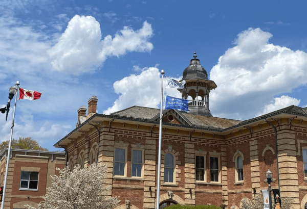 A Falun Dafa flag flies outside town hall in Orangeville, Ont., on May 12, 2023. (Courtesy of Falun Dafa Association of Canada)