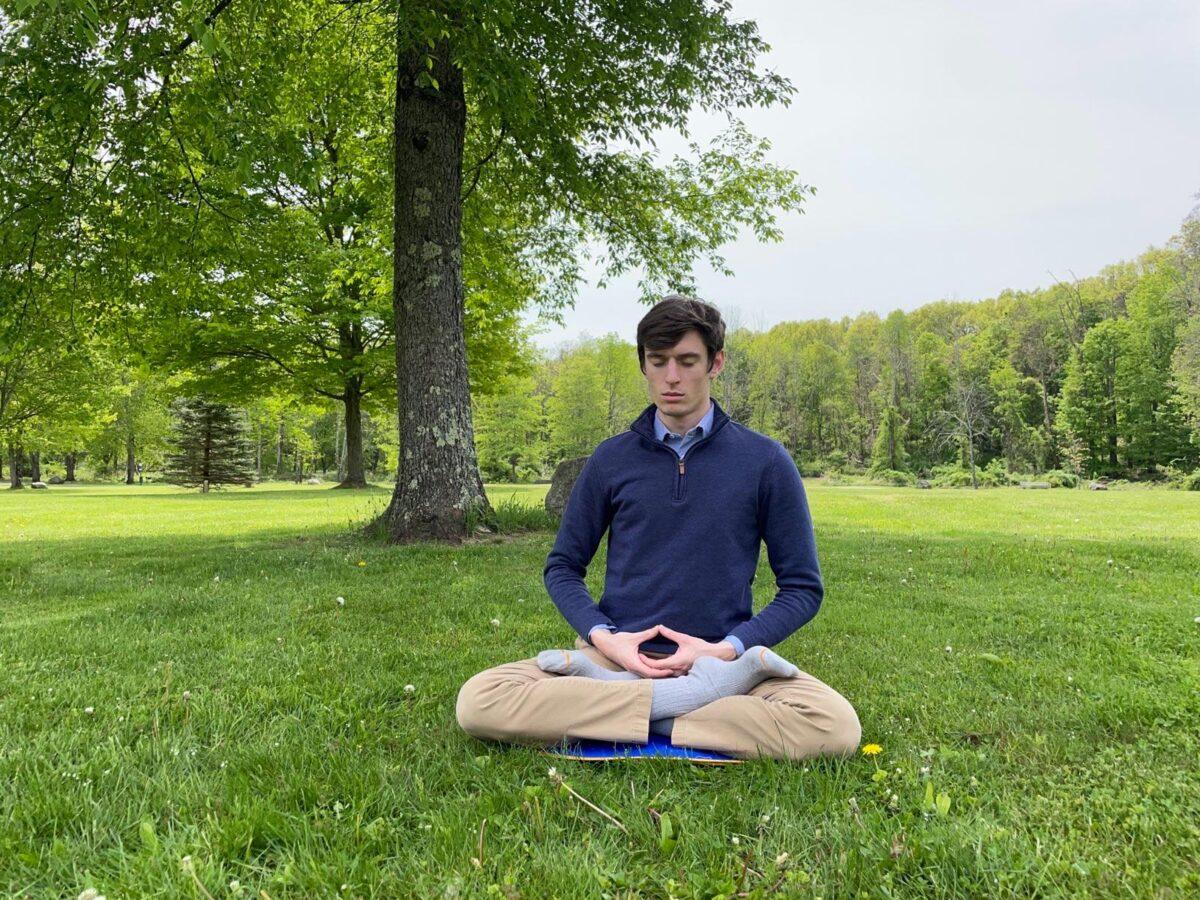 Nick Haley meditates in a park in upstate New York on May 13, 2023. (Courtesy of Nick Haley)