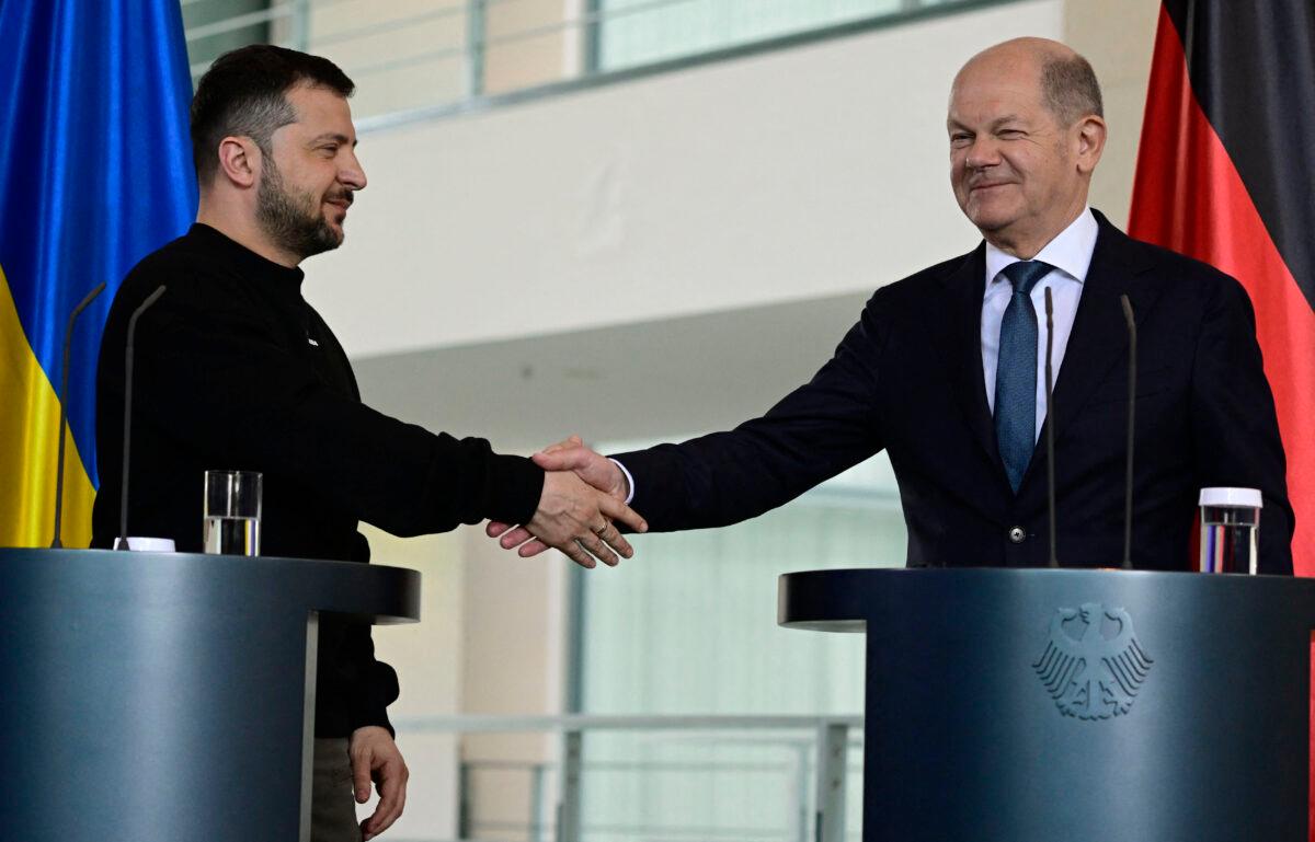 German Chancellor Olaf Scholz (R) and Ukraine's President Volodymyr Zelensky shake hands at the end of a joint press conference following their meeting at the Chancellery in Berlin on May 14, 2023 . (John MacDougall/AFP via Getty Images)