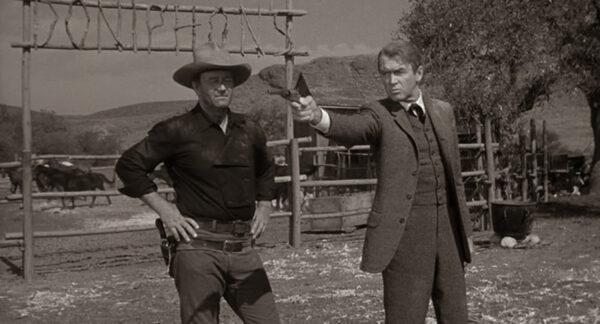 Tom Doniphon (John Wayne, L) and Ransom Stoddard (James Stewart) in “The Man Who Shot Liberty Valance” (Paramount Pictures)