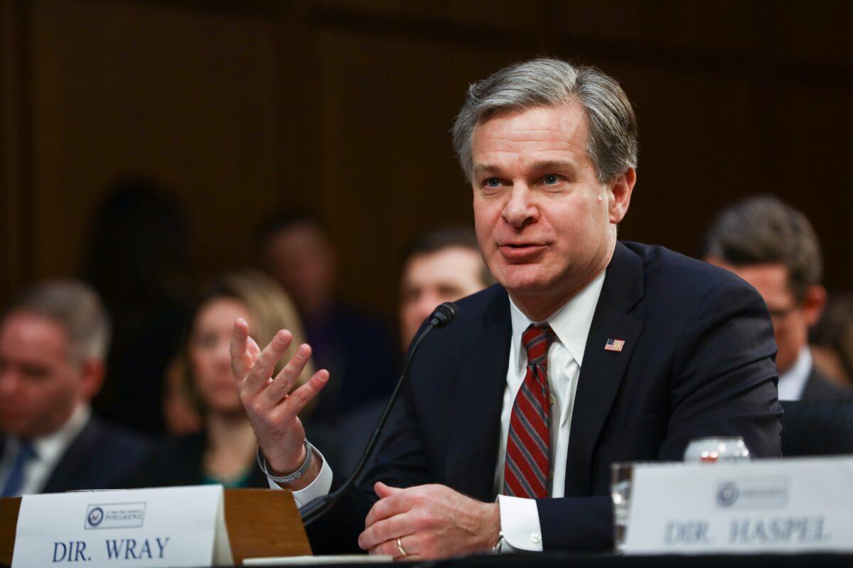 FBI Director Christopher Wray testifies at a Senate Intelligence Committee  hearing in Washington on Jan. 29, 2019. (Charlotte Cuthbertson/The Epoch Times)