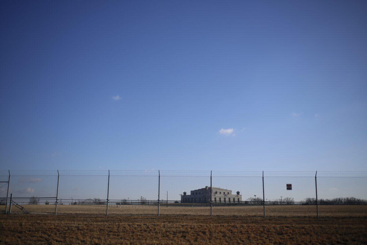 The United States Bullion Depository, which holds gold belonging to the U.S. Treasury Department, is seen behind a fence at Fort Knox in Fort Knox, Ky., on Feb. 27, 2014. (Luke Sharrett/Getty Images)