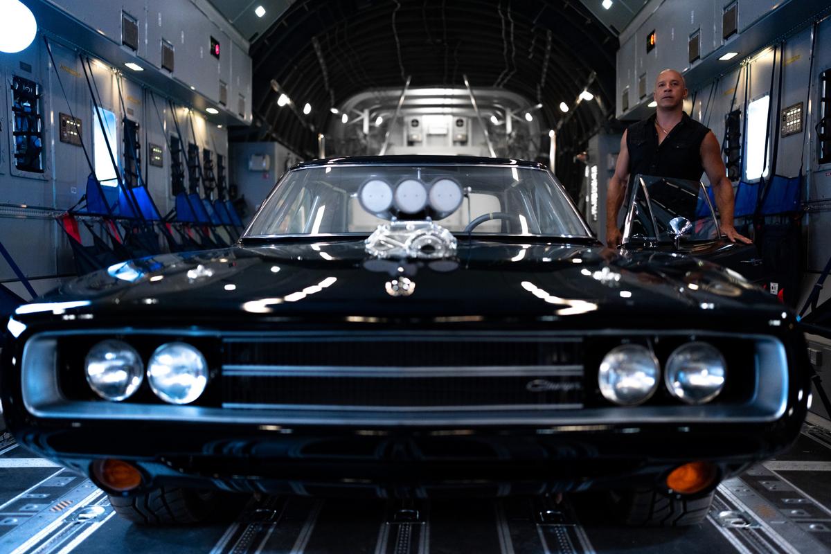 Dominic Toretto (Vin Diesel) with his '70 Dodge Charger, in “Fast X." (Peter Mountain/Universal Pictures)