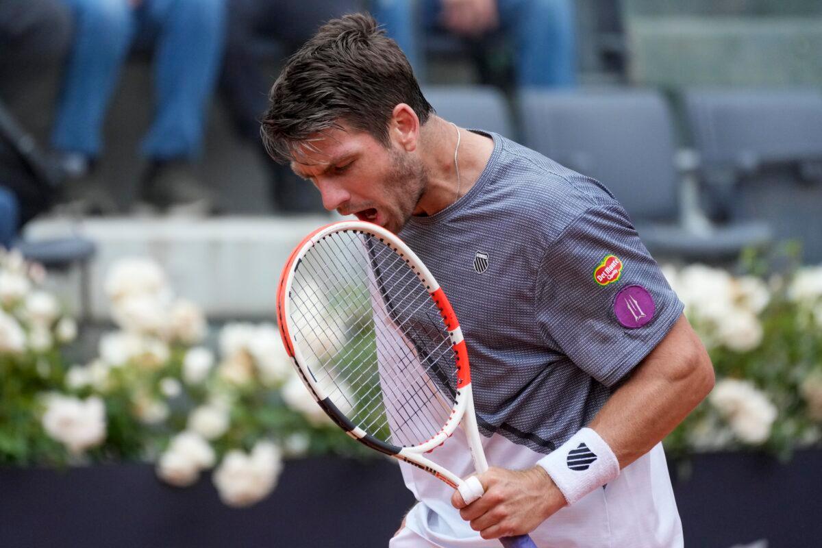 Cameron Norrie of Britain reacts after losing a point to Novak Djokovic of Serbia at the Italian Open tennis tournament in Rome on May 16, 2023. (Andrew Medichini/AP Photo)