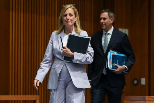 Australian Finance Minister Katy Gallagher and Treasurer Jim Chalmers arrive at a press conference during the Budget lockup at Parliament House in Canberra, Australia, on May 9, 2023. (Martin Ollman/Getty Images)