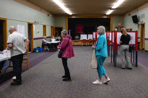 Voters wait in line to check in at their polling location during Kentucky Primary Elections at Deer Park Baptist Church in Louisville, Ky., on May 16, 2023. (Jon Cherry/Getty Images)