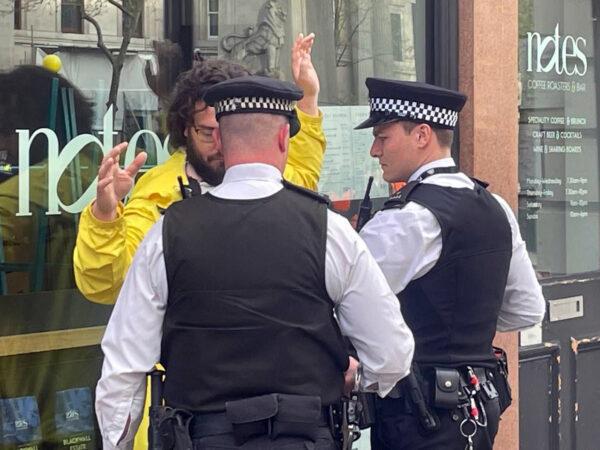 An anti-monarchy protester is arrested in central London during the coronation on May 6, 2023. (Labour4Republic/PA)