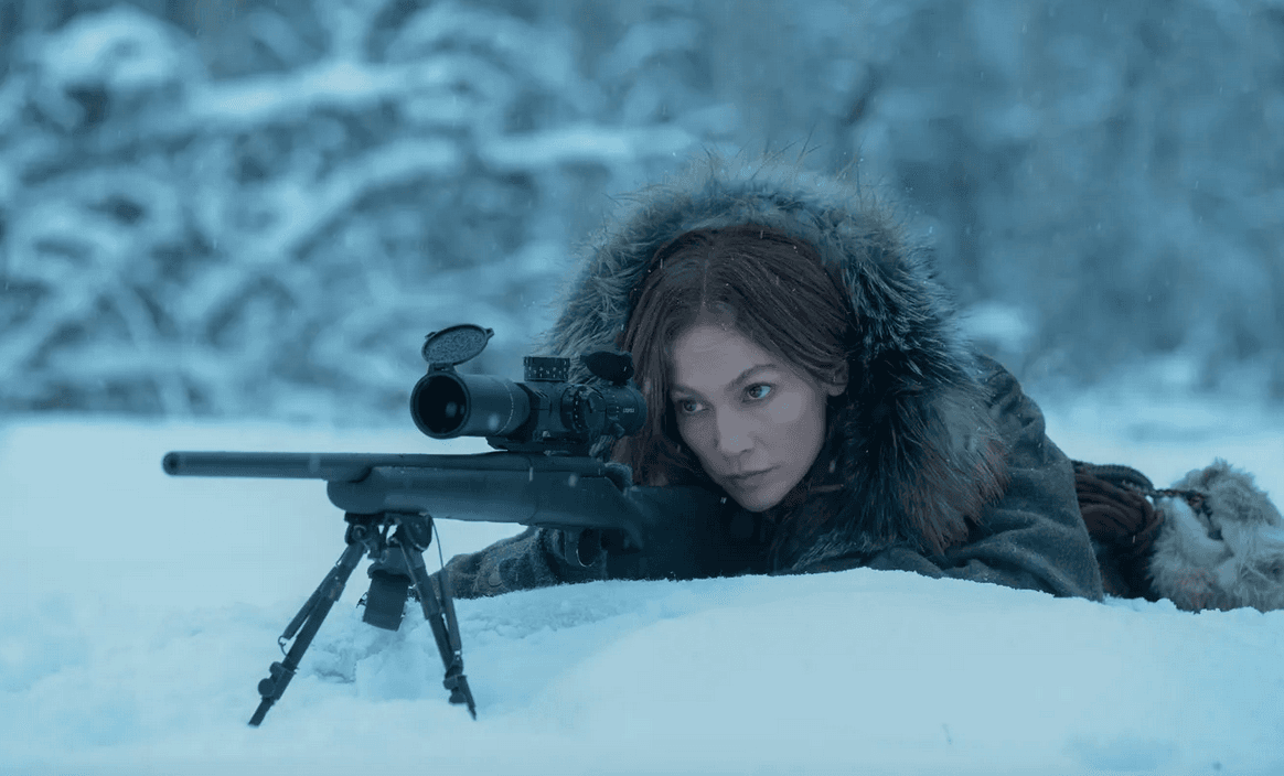 The Mother (Jennifer Lopez) taking aim at special operatives intent on kidnapping her daughter, in "The Mother." (Eric Milner/Netflix)