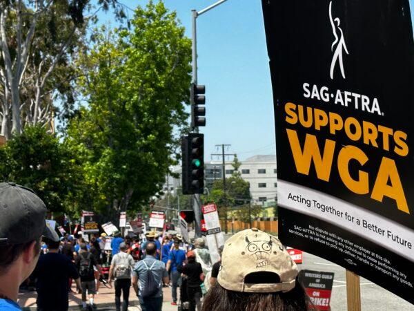 Members of the Screen Actors Guild - American Federation of Television and Radio Artists join the writers' strike launched by the Writers Guild of America in front of the Walt Disney Co.'s corporate headquarters in Burbank, Calif., on May 17, 2023. (Jill McLaughlin/The Epoch Times)