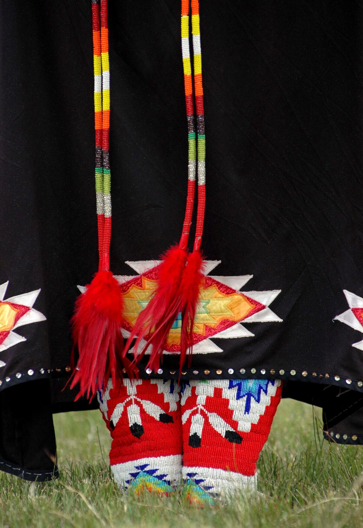 Intricate beadwork and textile patterns on Native American dress. (Kirsten Griffin)