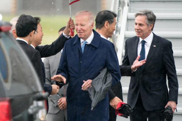 President Joe Biden (C) and U.S. Secretary of State Antony Blinken (R) arrive at Marine Corps Air Station Iwakuni on May 18, 2023, in Iwakuni, Japan. Biden arrived in Japan to attend the G7 summit, which will take place in Hiroshima. (Tomohiro Ohsumi/Getty Images)