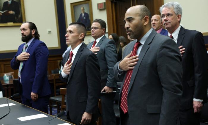 Suspended FBI special agent Garret O’Boyle (L), former FBI agent Steve Friend (C), and suspended FBI agent Marcus Allen (R) during a hearing in Washington on May 18, 2023. (Alex Wong/Getty Images)