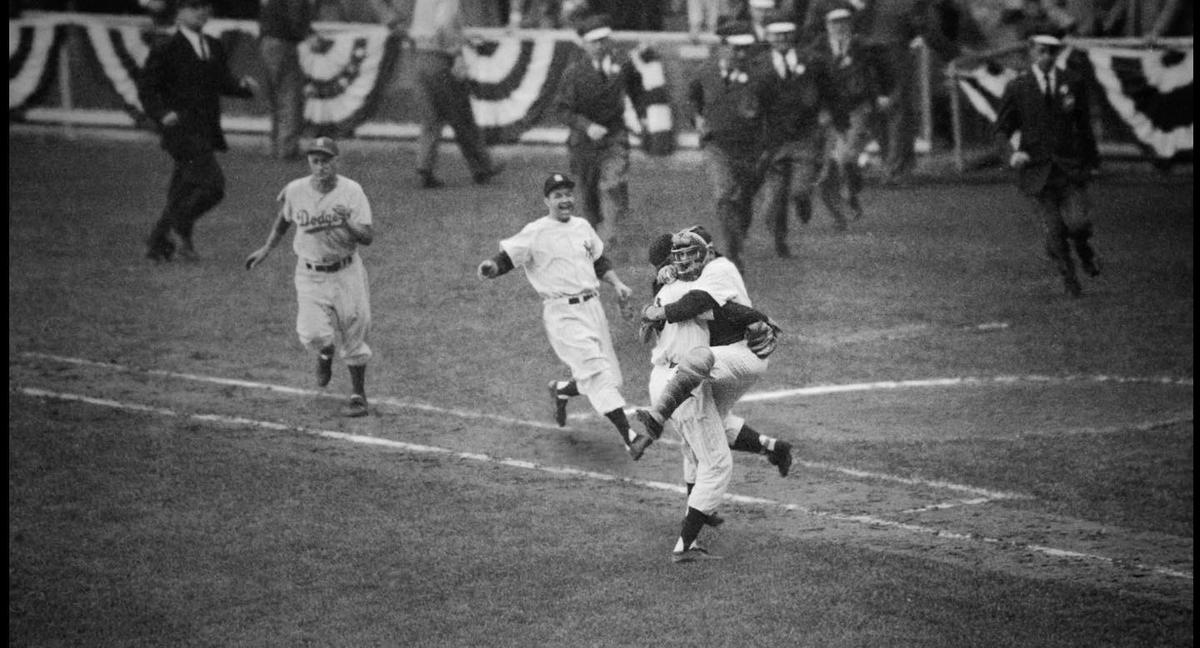 Yogi famously jumps on Don Larsen after Laron's no-hitter in "It Ain't Over." (Getty Images/Getty Images)