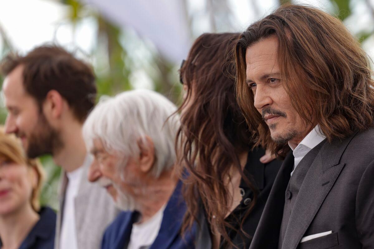 Johnny Depp poses for photographers at the photo call for the film "Jeanne du Barry" at the 76th international film festival in Cannes, southern France, on May 17, 2023. (Vianney Le Caer/Invision/AP)
