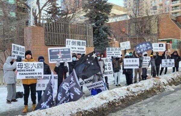 People demonstrate outside the Chinese Consulate in Calgary on March 9, 2023. As they travelled across Canada, Parkie and Angel Li brought together diaspora groups to call for the release of pro-democracy activists arbitrarily detained in China. (Courtesy of Parkie Li)