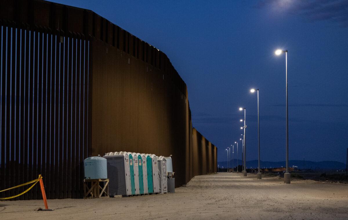 The border wall outside of Yuma, Ariz., on May 18, 2023. (John Fredricks/The Epoch Times)