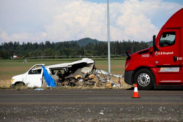 A damaged vehicle sits on the side of the road on Interstate 5, Northbound in Marion County, Ore., on May 18, 2023. (Abigail Dollins/Statesman Journal via AP)