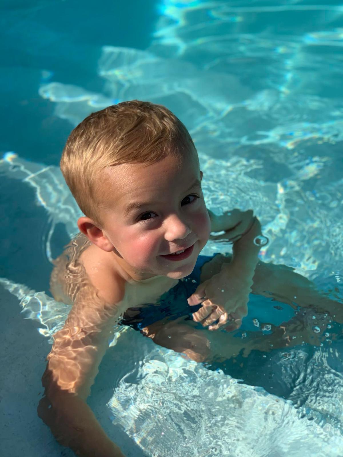 Max, now 6, survived a near-fatal drowning accident in 2019. He says Jesus had held him in the pool that day. (Courtesy of Courtney McKee)