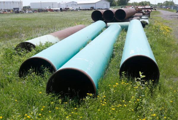 Pipeline used to carry crude oil sits at the Superior, Wis., terminal of Enbridge Energy, on June 29, 2018. (Jim Mone/AP Photo/File)