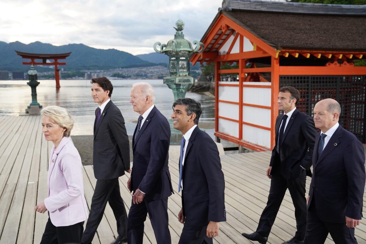 European Commission President Ursula von der Leyen, Canada's Prime Minister Justin Trudeau, U.S. President Joe Biden, UK Prime Minister Rishi Sunak, French President Emmanuel Macron, and German Chancellor Olaf Scholz arriving for the family photo at the Itsukushima Shrine during the G-7 summit in Hiroshima, Japan, on May 19, 2023. (Stefan Rousseau - Pool/Getty Images)