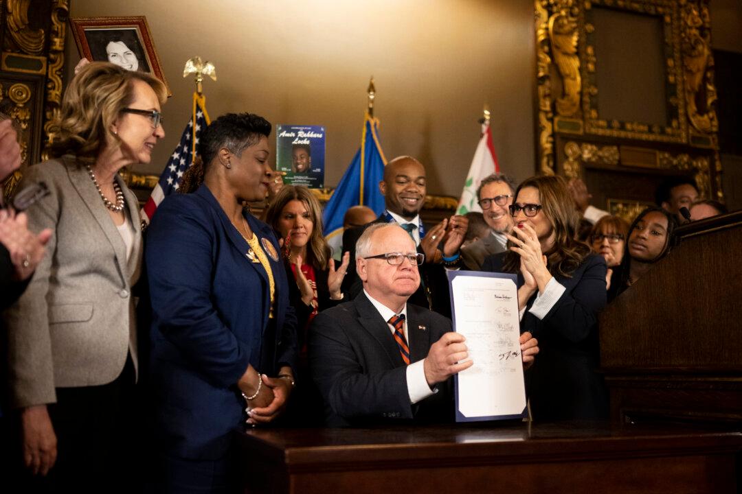 Minnesota Gov. Walz Signs Bill to Tighten Gun Control Measures