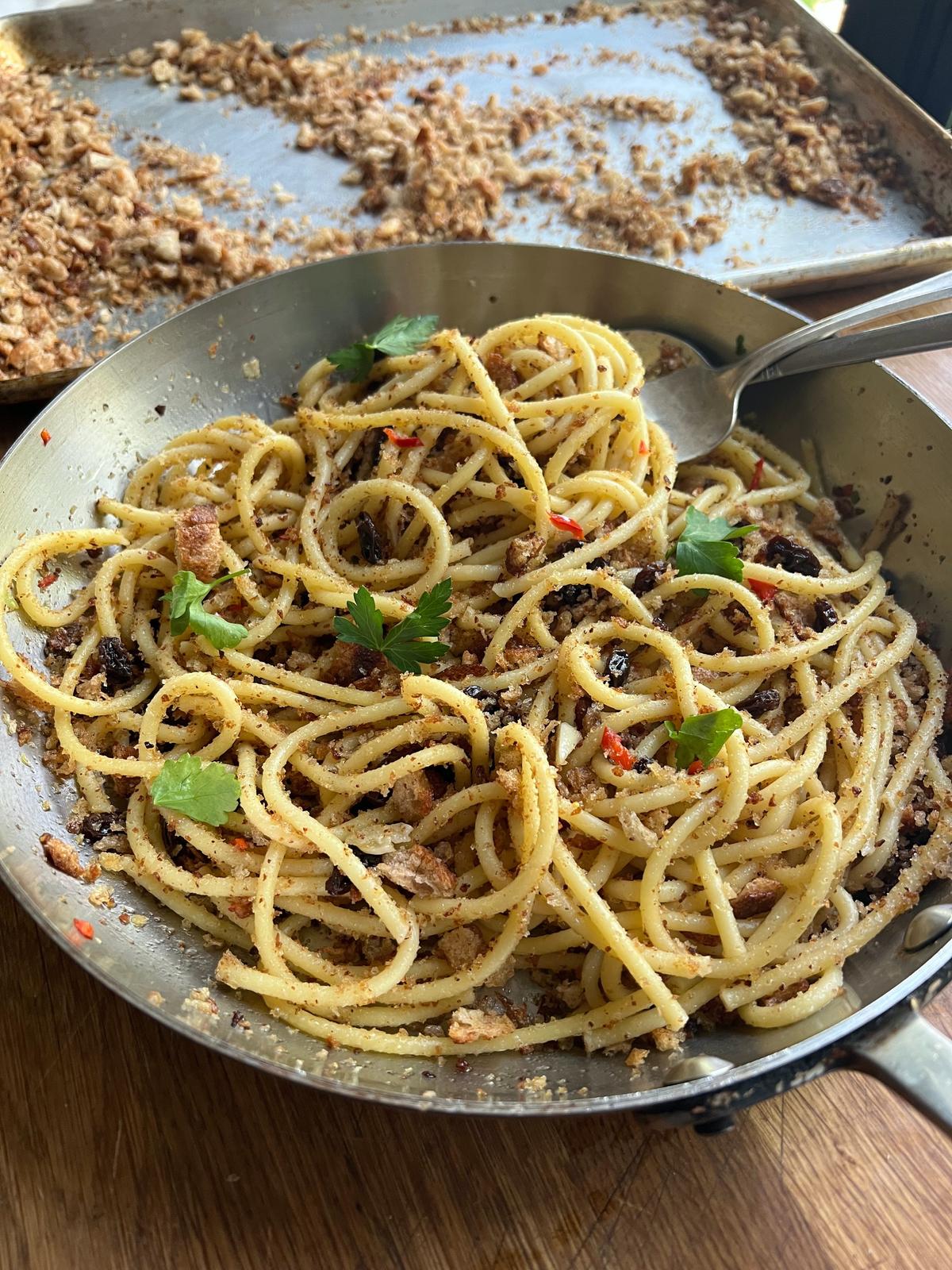 This minimalist Sicilian recipe for pasta with breadcrumbs and raisins is sweet, spicy and crunchy. (Gretchen McKay/Pittsburgh Post-Gazette/TNS)