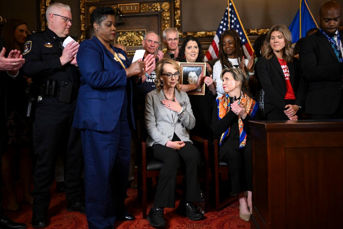 Former Arizona Rep. Gabby Giffords, a mass shooting survivor, is recognized by gun control advocates at the Minnesota Capitol in St. Paul on May 19, 2023. (Aaron Lavinsky/Star Tribune via AP)
