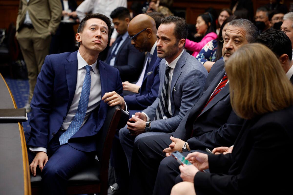 TikTok CEO Shou Zi Chew (L) talks with company Vice President for Public Policy Michael Beckerman (C) during a break in Chew's testimony before the House Committee on Energy and Commerce on Capitol Hill in Washington on March 23, 2023. (Chip Somodevilla/Getty Images)